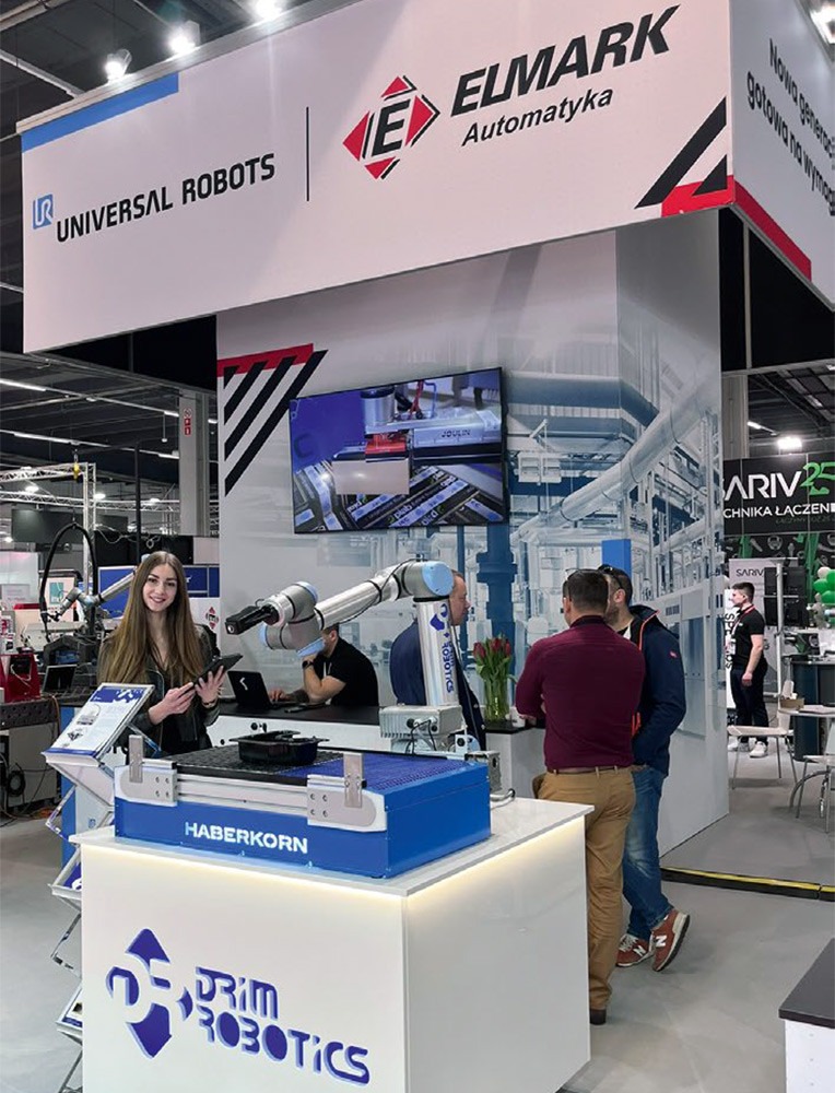 Pokaz robotyzacji z robotami współpracującymi Universal Robots na stoisku Elmark Automatyka